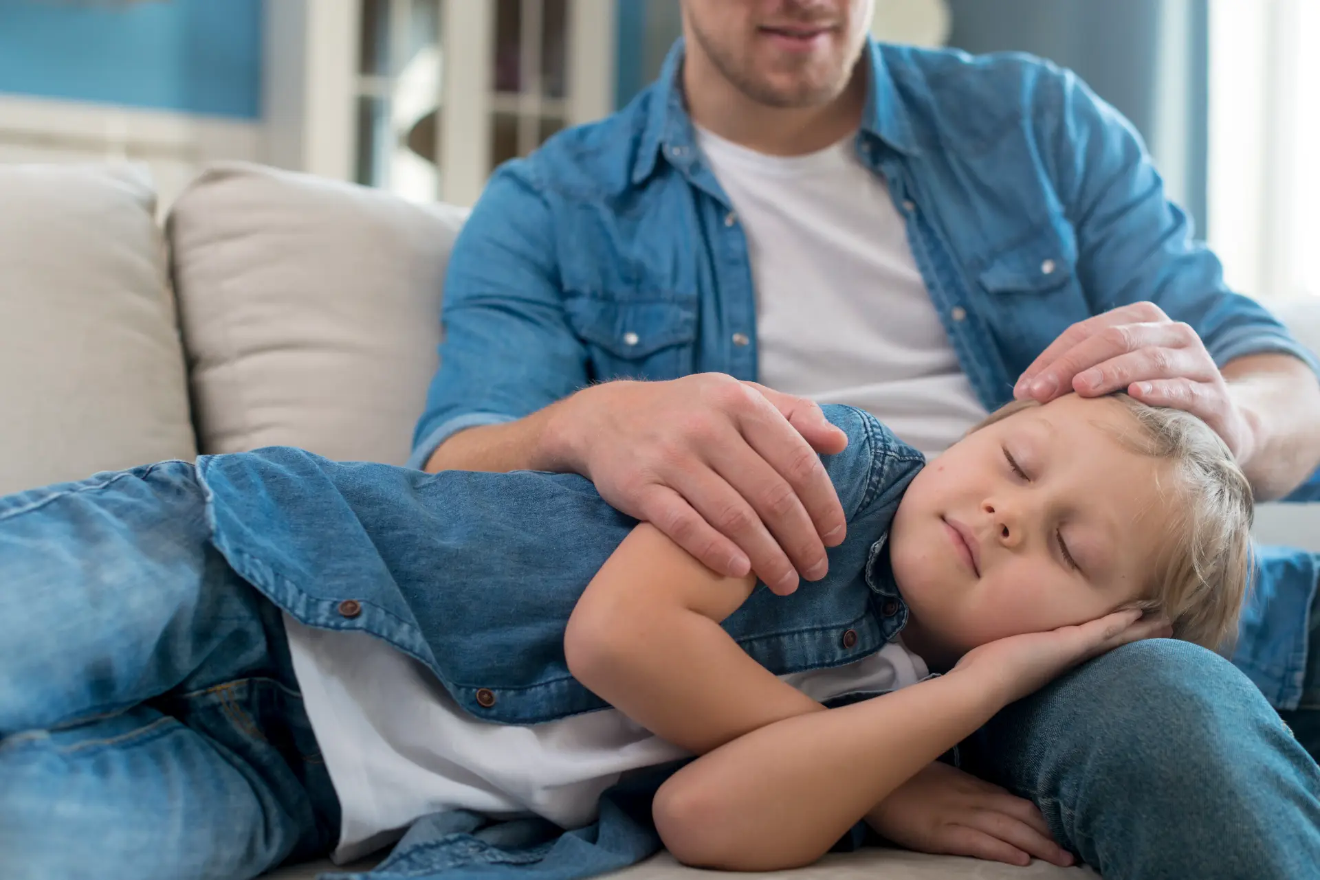 child-sleeping-father-s-legs